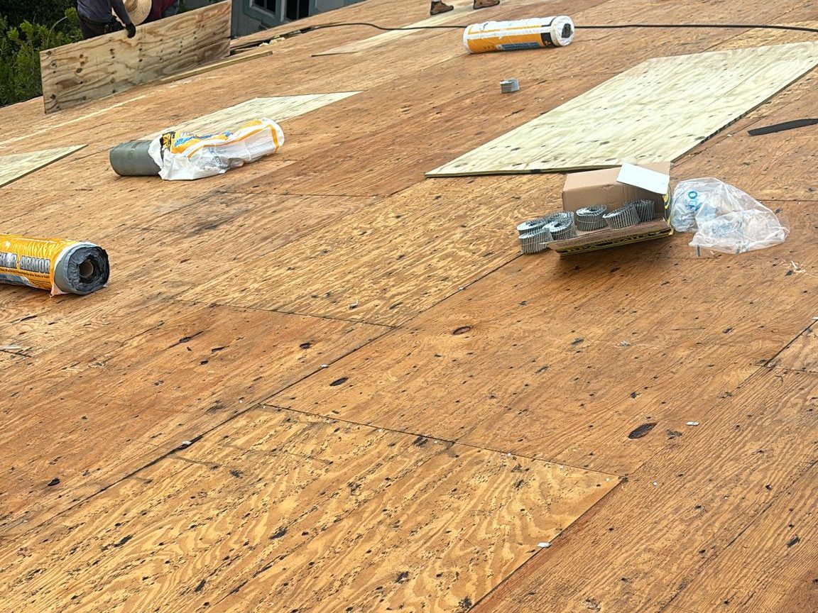 Exposed roof decking inspected for rot