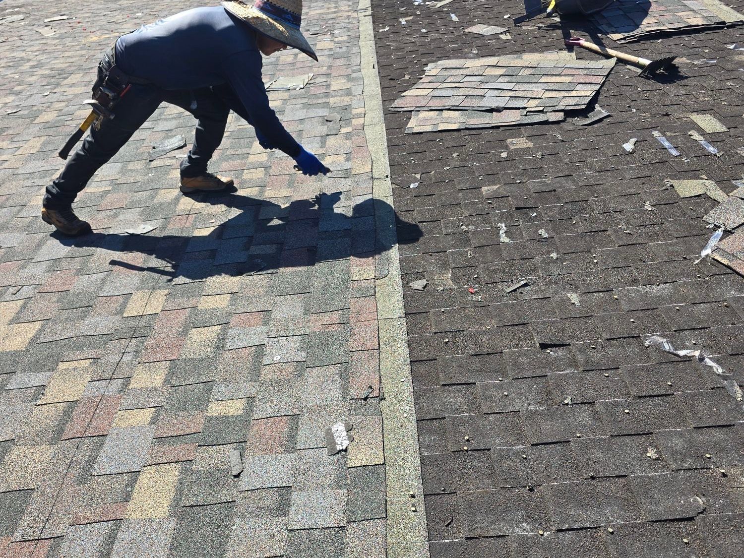 Redbird inspector documenting storm-damaged shingles in Baton Rouge